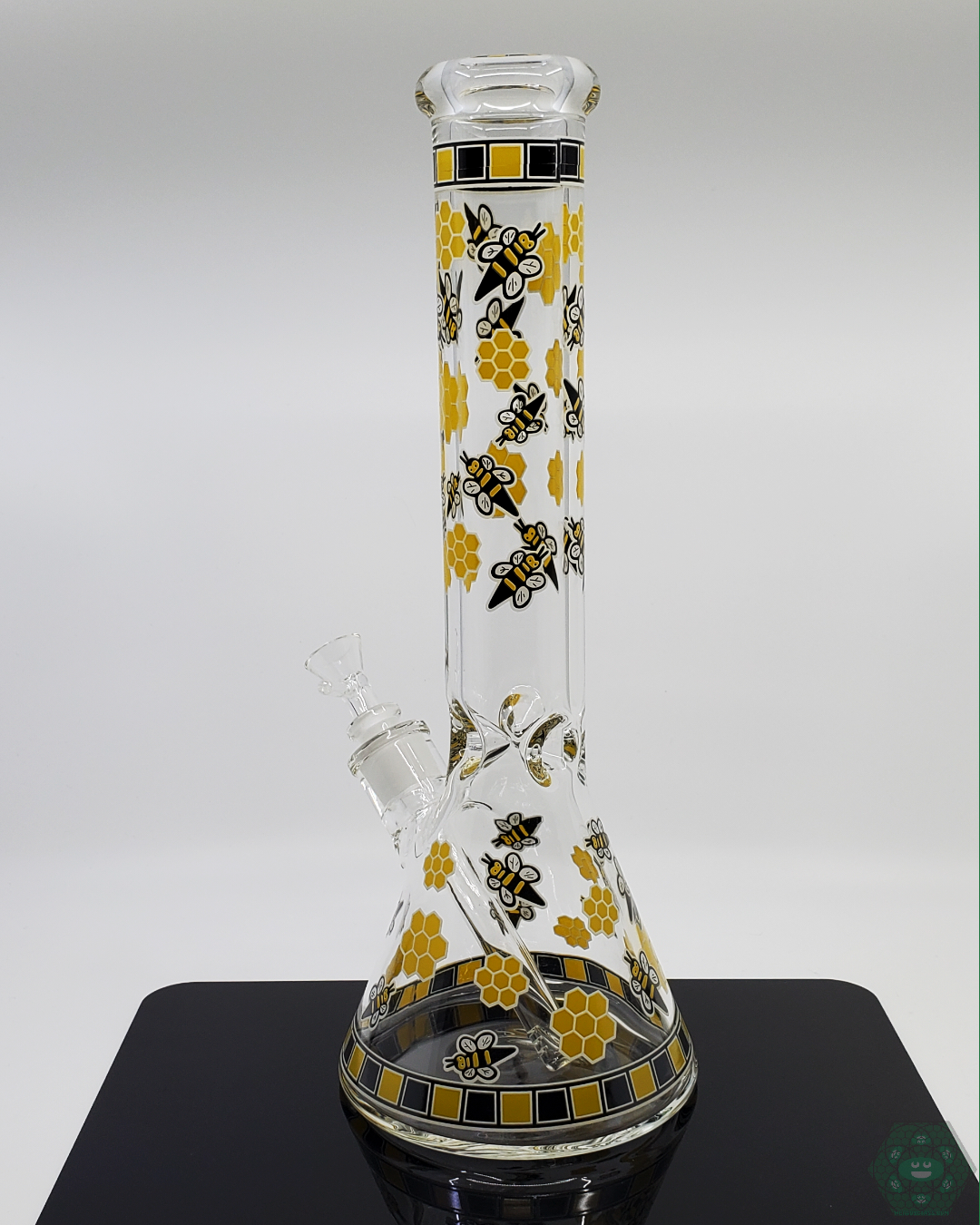 BSG Glow-in-the-Dark Bee Beaker, 14-inch glass water pipe with a unique bee design, perfect for eye-catching sessions.


