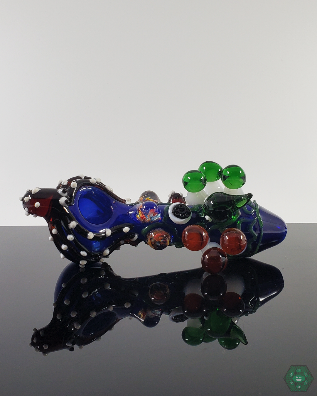 BSG Kraken Spoon, an ocean-themed 5” glass pipe, perfect for collectors with its thick construction and unique design.