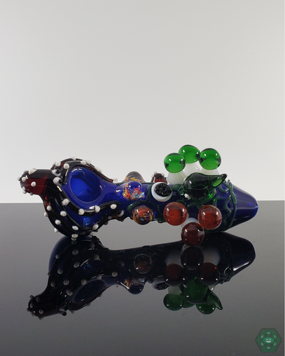 BSG Kraken Spoon, an ocean-themed 5” glass pipe, perfect for collectors with its thick construction and unique design.