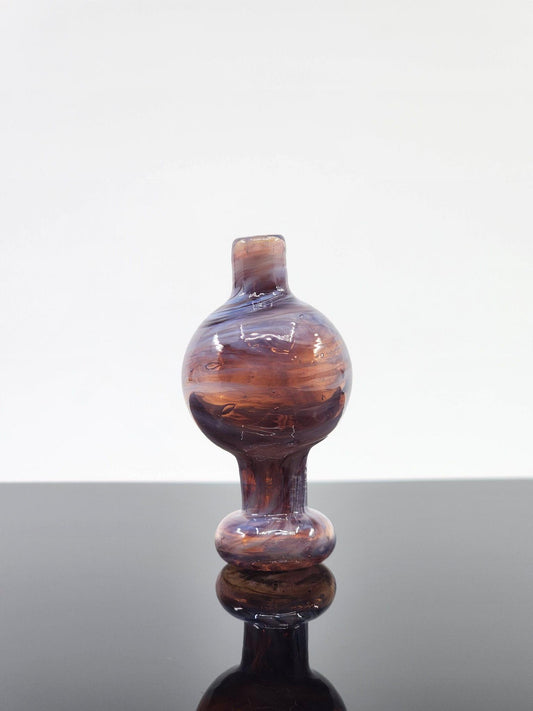 Close-up of the BSG Milky Bubble Cap, highlighting its milky design and durable construction, optimized for smooth and flavorful dabs.