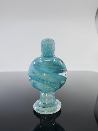 Close-up of the BSG Spiral Airflow Bubble Cap, showcasing its unique spiral design and durable construction for optimized airflow and smoother hits.