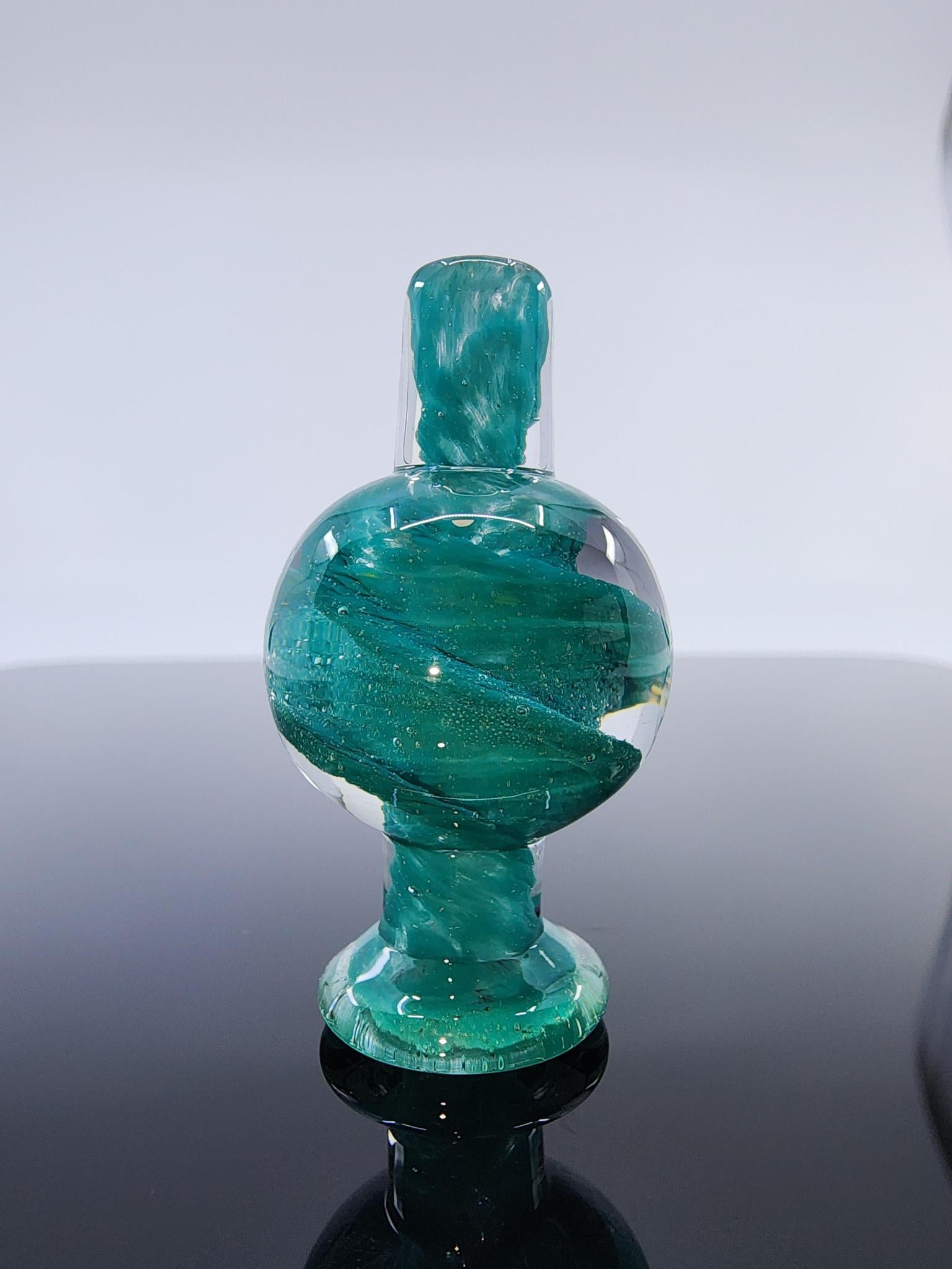 BSG Spiral Airflow Bubble Cap in hand, demonstrating its ergonomic design and easy handling for efficient airflow during dabbing sessions.