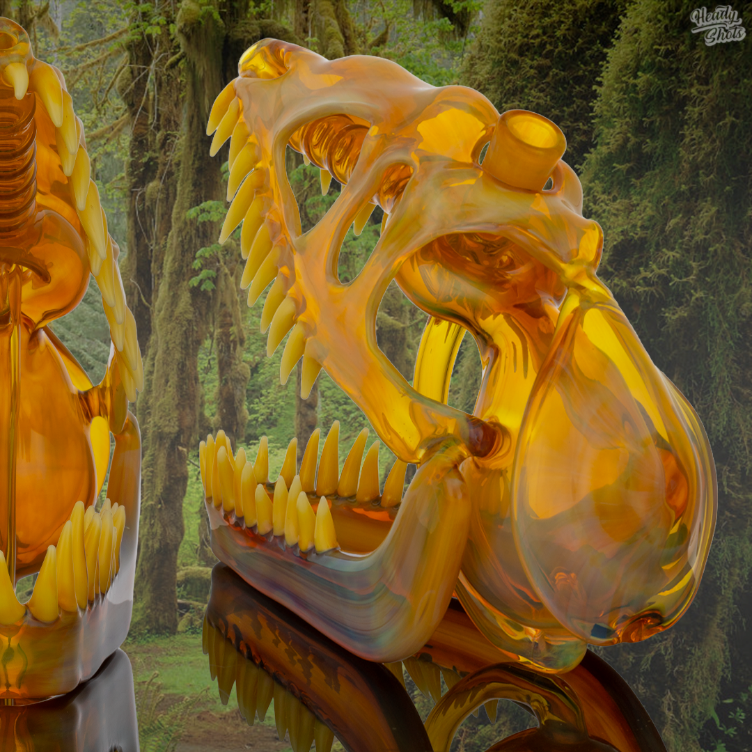  Side view of Buck Glass NS Yellow Allosaurus Skull Dab Rig, highlighting intricate glass detailing and craftsmanship.


