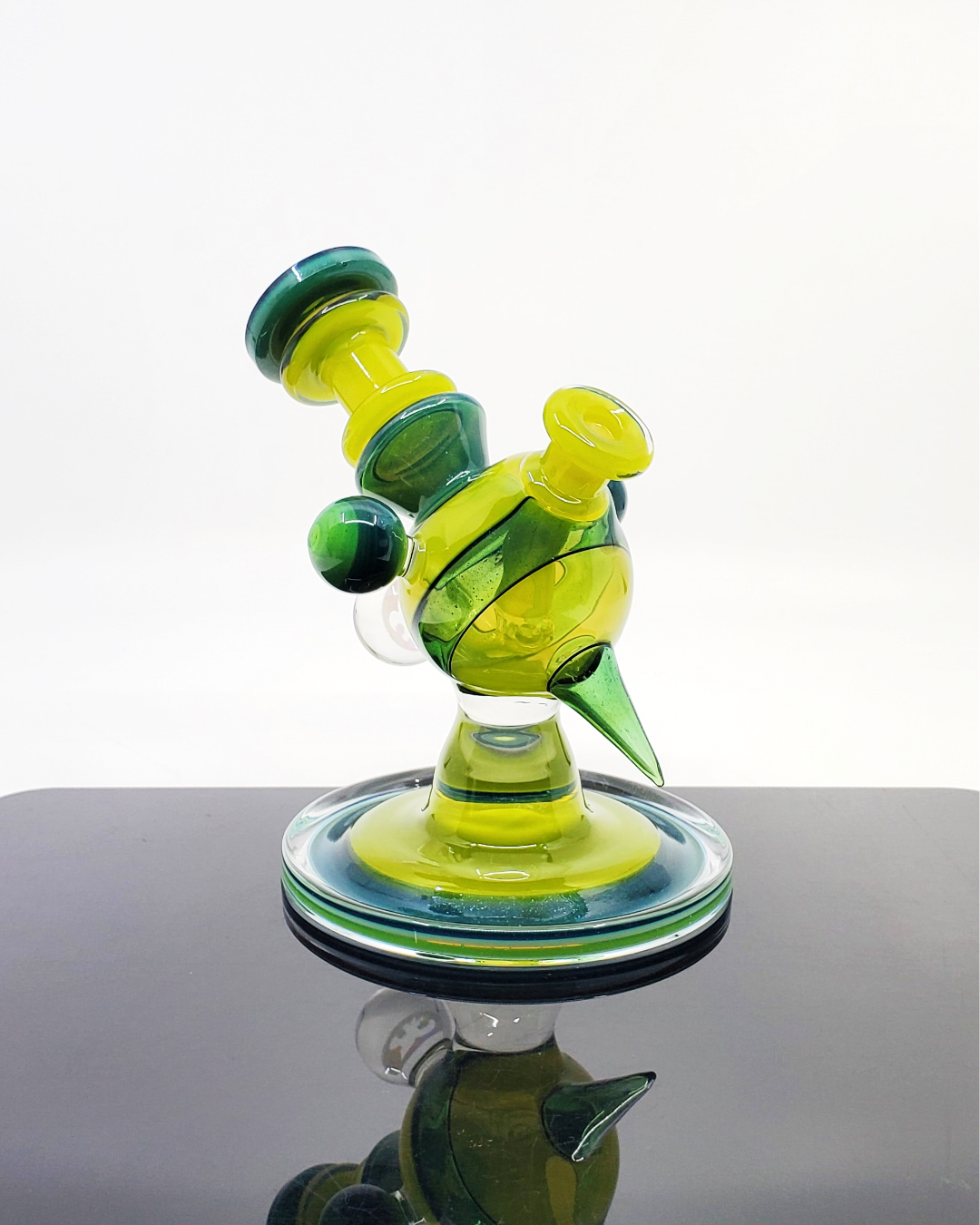 Cajun Glass Two-Tone Heliosphere, a heady glass dab rig with a modern two-tone finish, blending simplicity and style in a functional and visually captivating 14mm rig, ideal for enthusiasts who value quality craftsmanship in a minimalistic design.