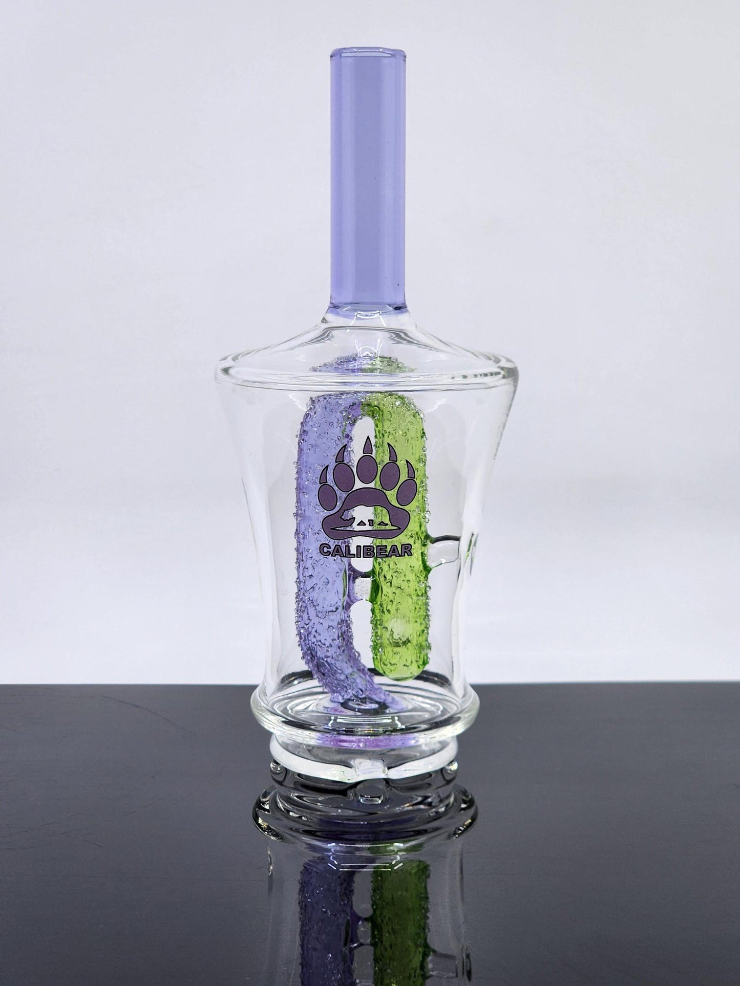  Calibear Glass Peak/Peak Pro Attachment in action, showcasing its pinhole perc for optimized airflow.