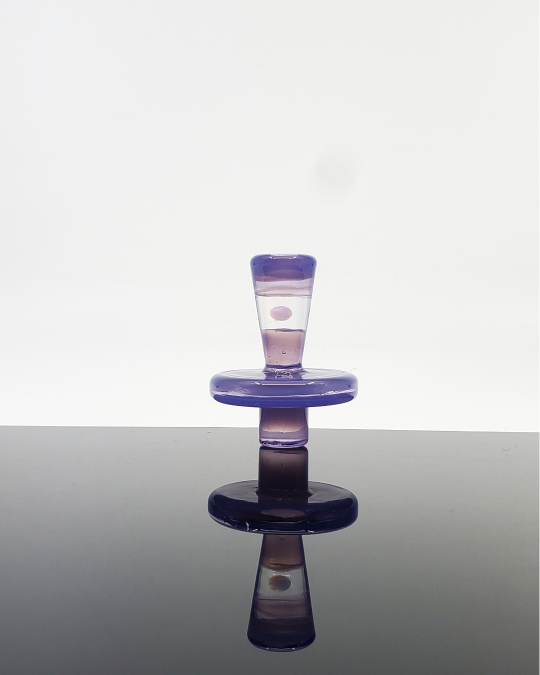  Close-up of the luxurious opal accent on the Campfire Quartz Opal Tower Cap.

