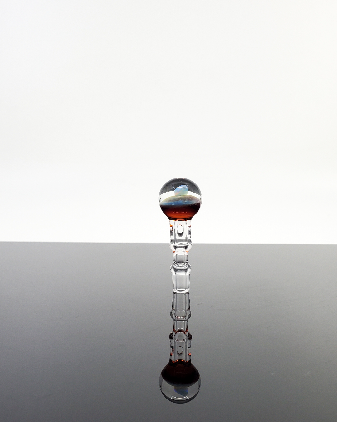 Close-up of the Captain Tokez 3DXL Joystick Cap's opal top, showcasing intricate color details.