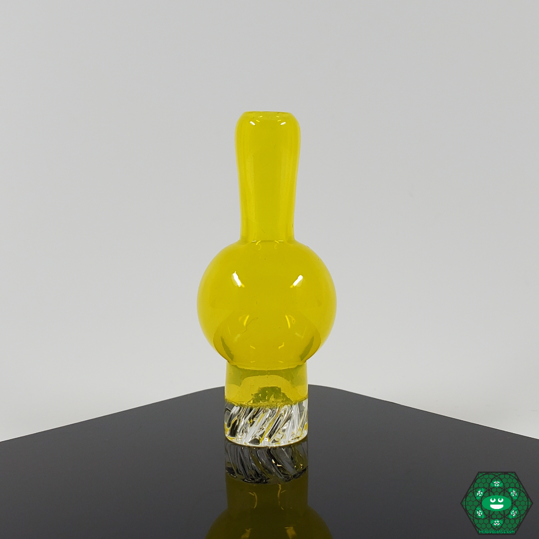  Chill & Relax Glass Spinner Caps attached to a setup, demonstrating their precise design for better airflow and enhanced vapor control.