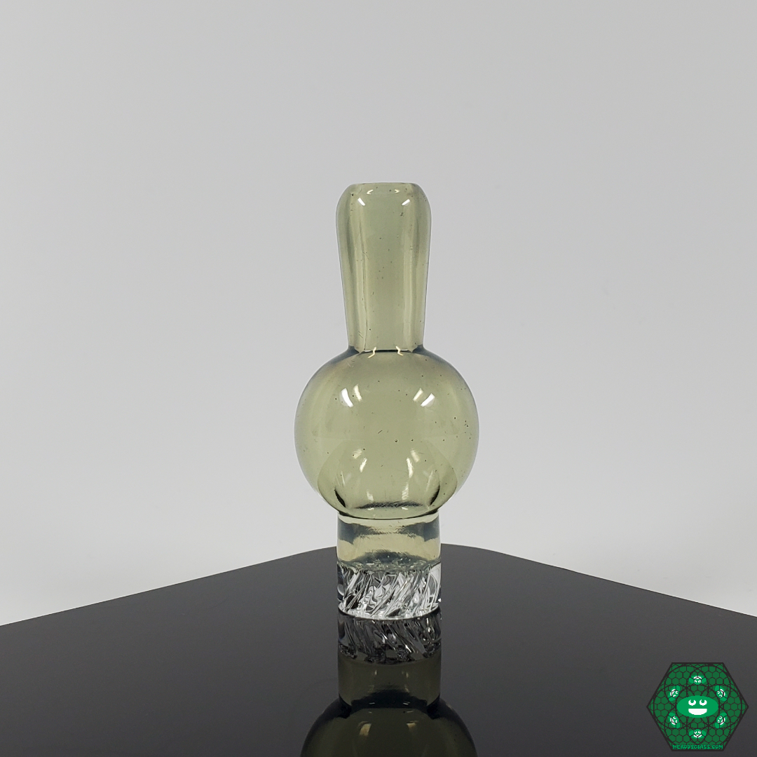 Chill & Relax Glass Spinner Caps in action, showing their spinner feature delivering even airflow and clean vapor during dabbing sessions.