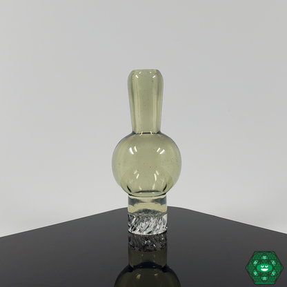 Chill & Relax Glass Spinner Caps in action, showing their spinner feature delivering even airflow and clean vapor during dabbing sessions.