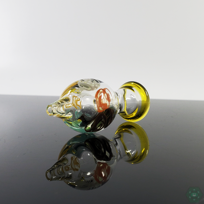 Chunk Glass Bubble Cap in action, showcasing compatibility with quartz bangers for optimized vaporization.