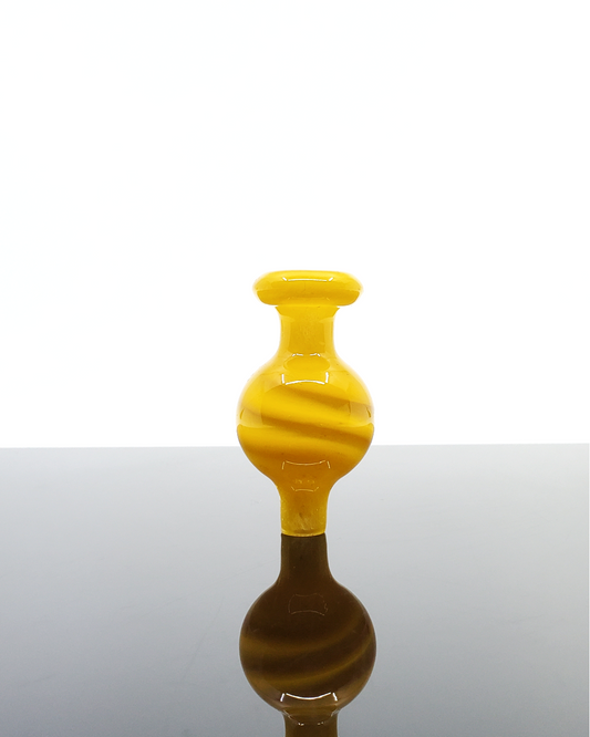 Color Swirl Bubble Cap with a unique swirl pattern, providing controlled airflow for an enhanced dabbing experience and a pop of color to your setup.






