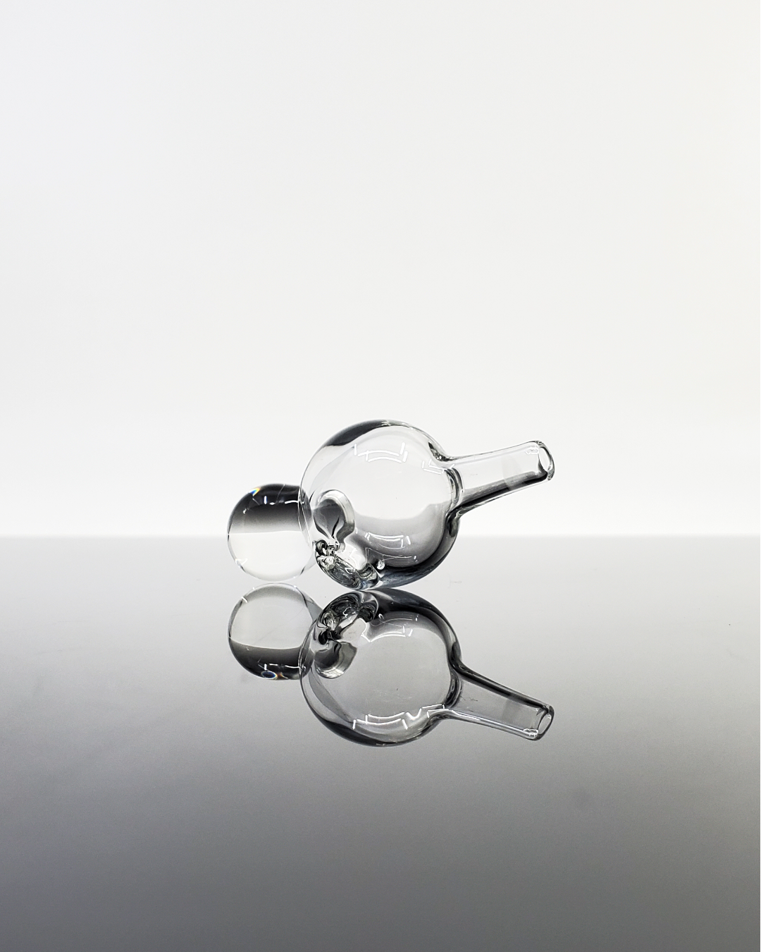 Dabfigalo Glass Clear Bubble Cap with minimalist design, offering effective vapor control and compatibility with various setups for optimal airflow.