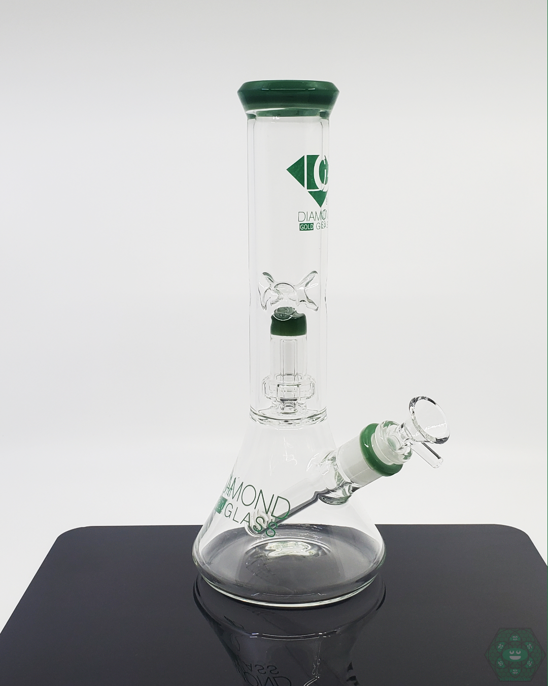 Diamond Glass 11-inch UFO Perc Beaker with 14mm joint offering smooth filtration and a unique perc design for efficient use