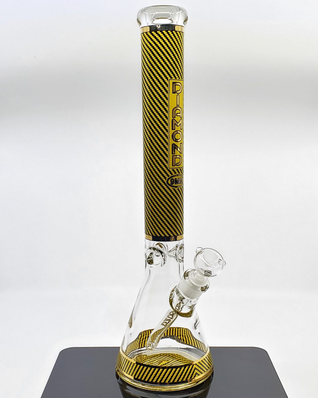  Side view of the Diamond Glass 9mm Checkered Beaker, showcasing its heavy-duty construction, removable downstem, and sleek checkered pattern for easy maintenance and style.