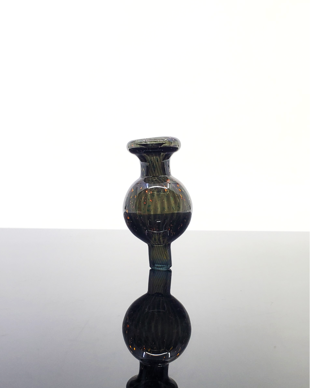 Dichro Bubble Cap featuring a stunning dichroic glass finish for visual appeal, designed for efficient airflow, smooth hits, and enhanced flavor retention.