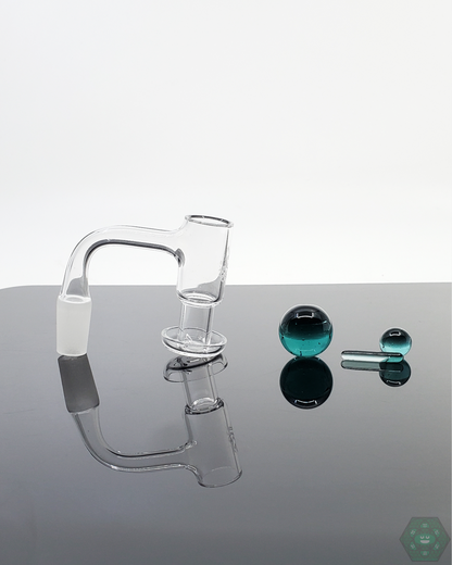 Angled view of Doq Glass Premium Slurper Set, showcasing its precision quartz components.