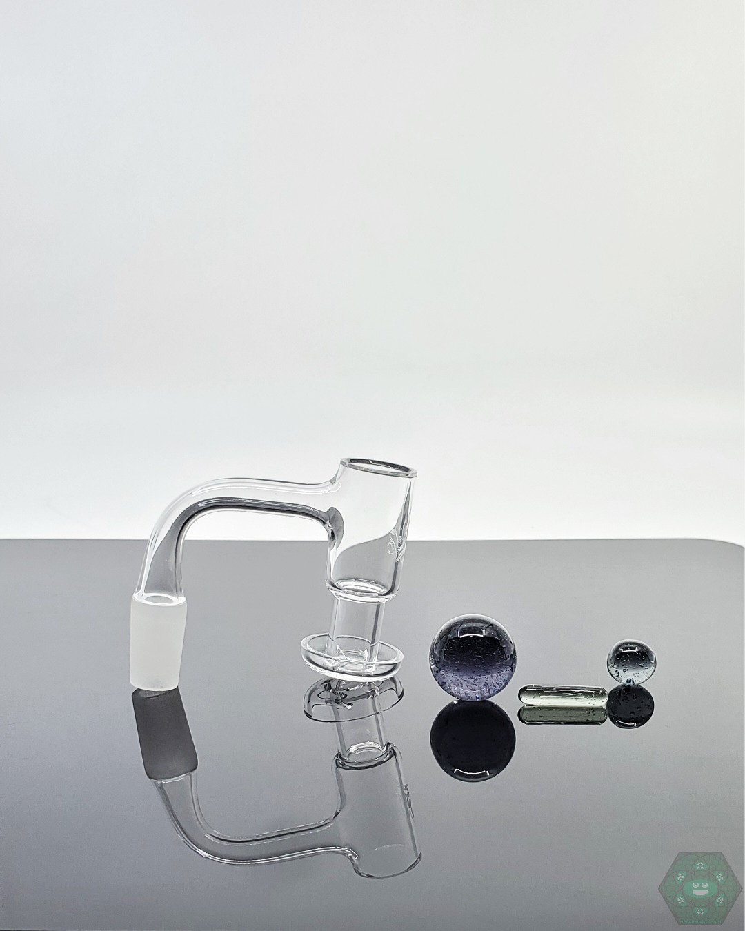 Doq Glass Premium Slurper Set in a dab session, demonstrating its smooth and efficient vaporization.