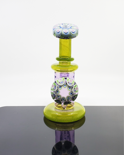 Dotstack Jammer with Cabbed Mouthpiece: The RL Dots Dotstack Jammer features a unique cabbed mouthpiece and an intricate dotstack pattern, creating a functional and visually appealing 14mm dab rig.
