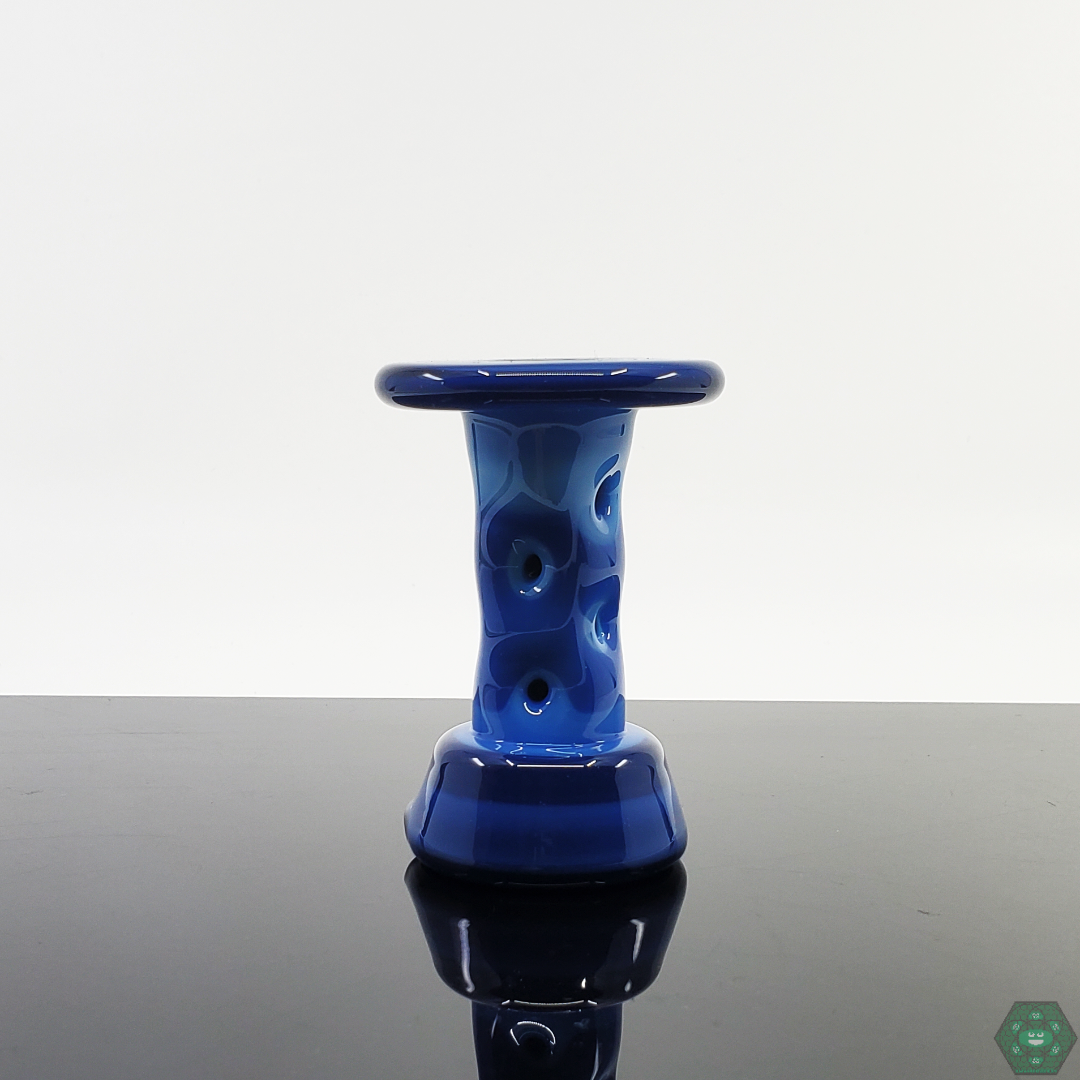 Close-up of the Durin Glass Cooling Tower Puffco Attachment, featuring vibrant full-color glasswork.

