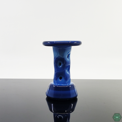 Close-up of the Durin Glass Cooling Tower Puffco Attachment, featuring vibrant full-color glasswork.

