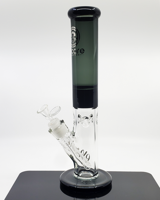  Side view of the Encore Glass 14” Color Mashup Straight Tube, showcasing its unique vibrant design and efficient filtration for smoother hits.