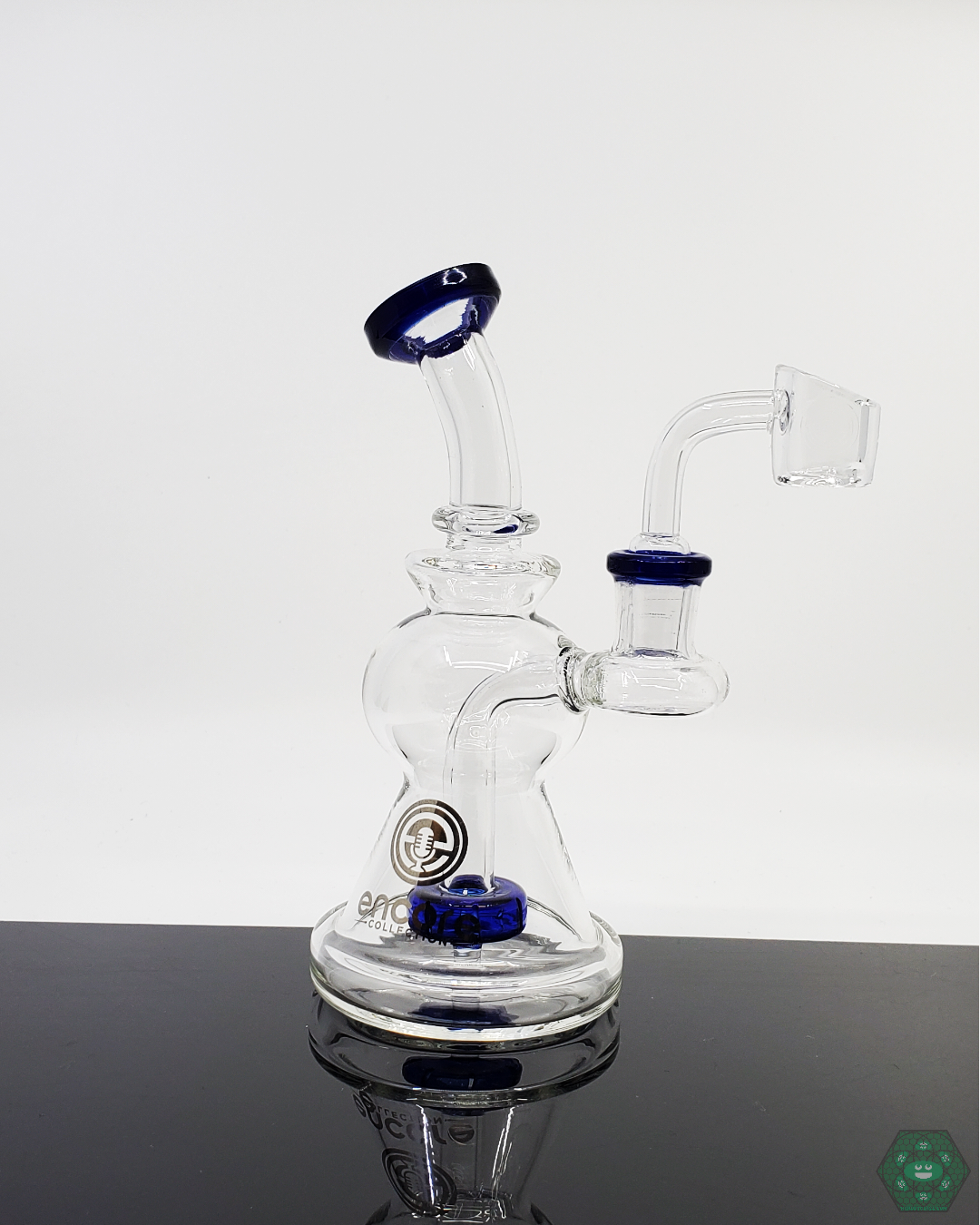 Encore Glass 6-inch Showerhead Rig with 8-hole perc, providing smooth diffusion and a 14mm female joint, available in Blue, Green, and Teal