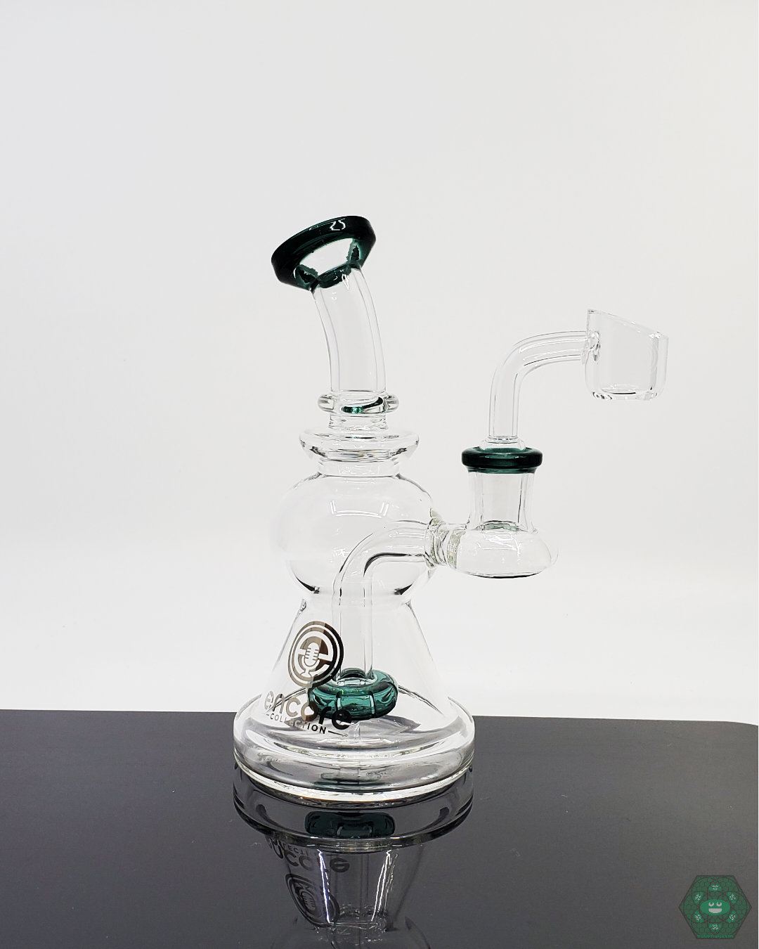 Encore Glass 6-inch Showerhead Rig, compact design with 8-hole perc for smooth diffusion, available in Blue, Green, and Teal for personalized style