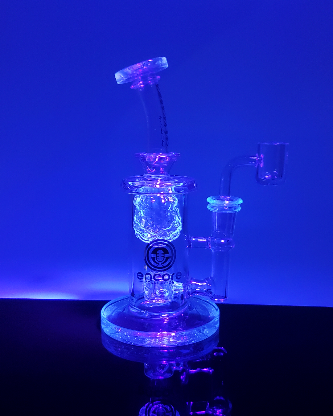 Close-up view of the Encore Glass 7.5” UV Pineapple Incycler, showcasing its intricate design and advanced filtration system for optimal vapor.