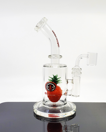 Side view of the Encore Glass 8.5” Pineapple Jammer with a quartz bucket and 4-hole perc, perfect for enjoying smooth, flavorful sessions.