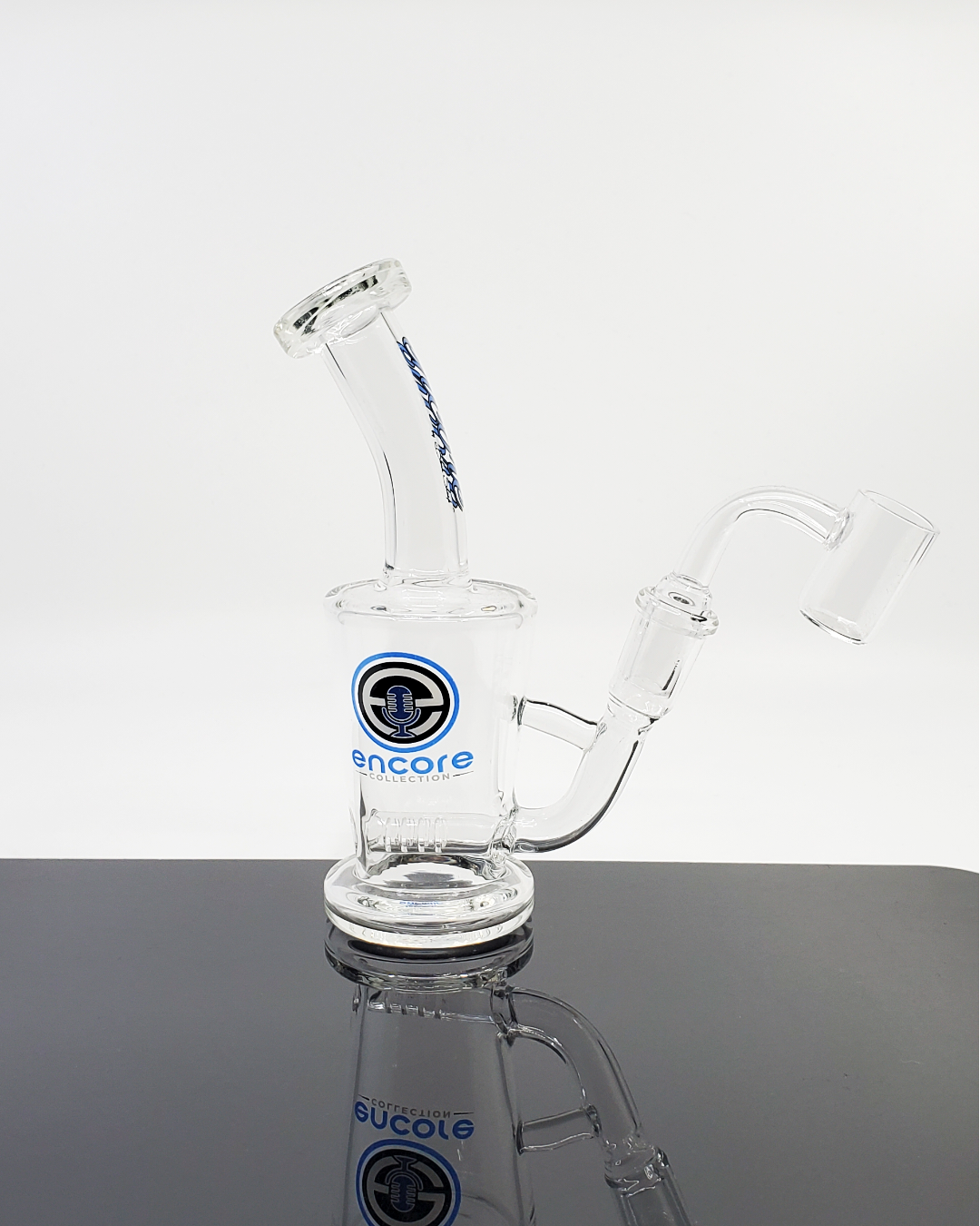 Encore Glass Shot Glass Rig, a fun and compact design perfect for travel, offering smooth hits and playful functionality