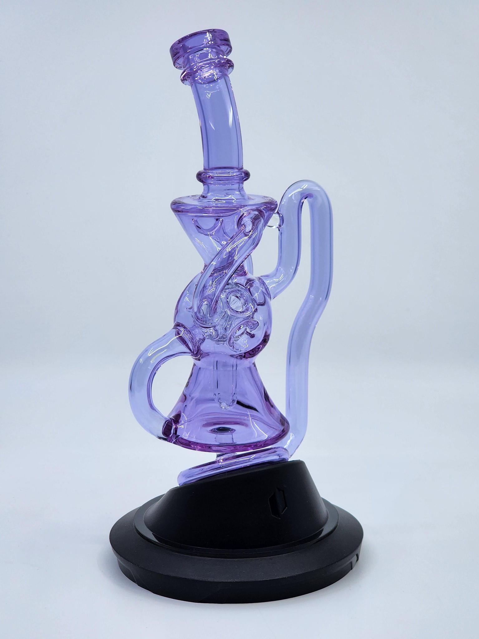 Close-up of the 5-hole disk perc in the Exo Recycler Puffco Attachment, optimizing airflow and vapor cooling.