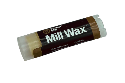  Flower Mill Mill Wax, a natural hemp and beeswax blend designed to reduce friction and maintain mill performance, made in the USA.