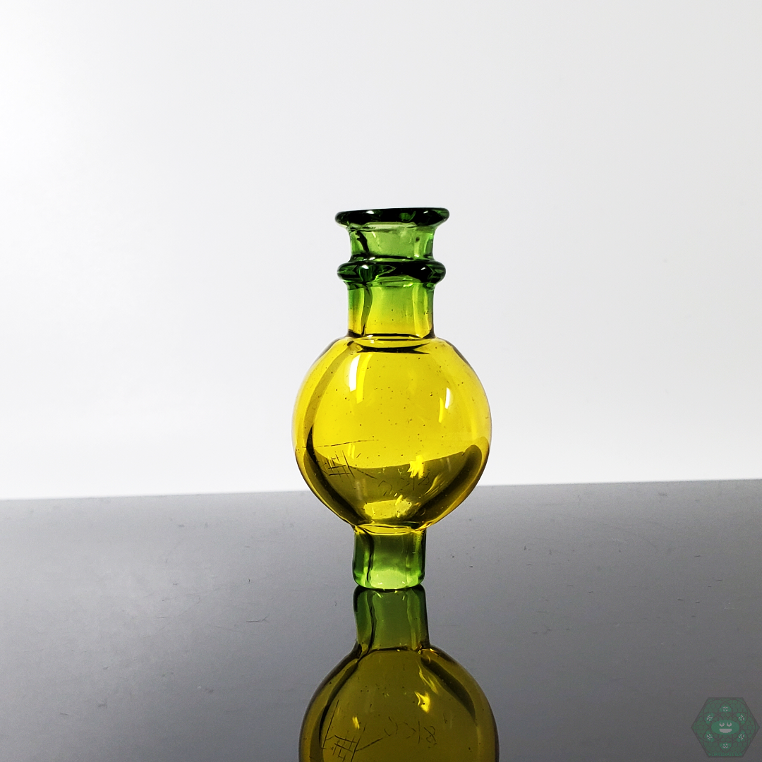 Freeek Glass Terps Bubble Cap featuring a custom design for precise airflow and maximum terpene retention, enhancing the dabbing experience.