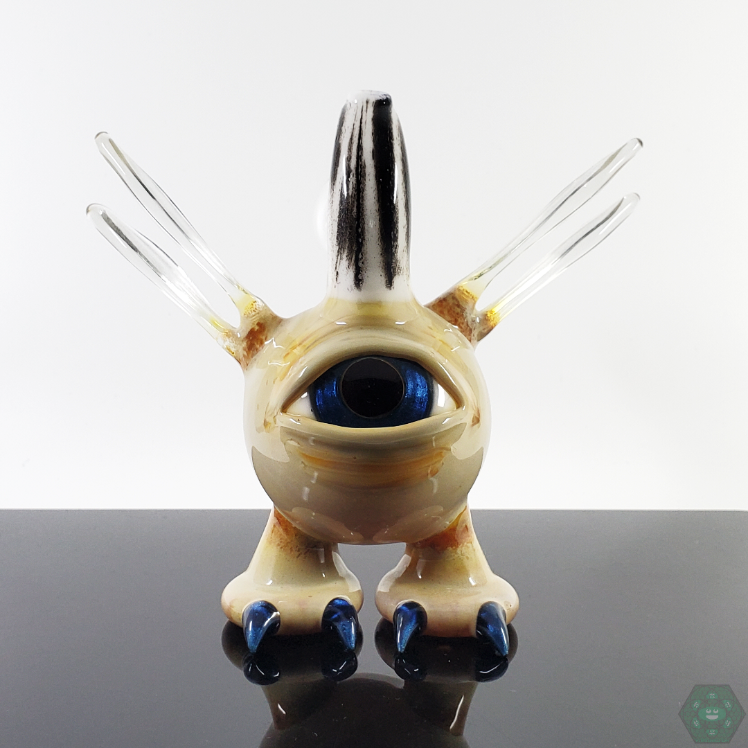 Front view of the Gemini Andy Flying Eye Pendant, showcasing intricate glasswork and unique design.