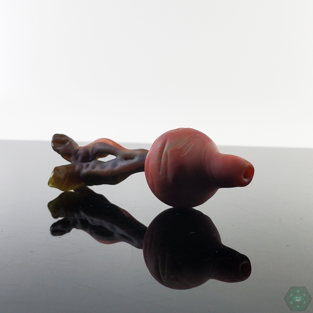 Glass By Boots Carrot Caps with a fun carrot-inspired shape, delivering precise airflow for optimal dabbing performance