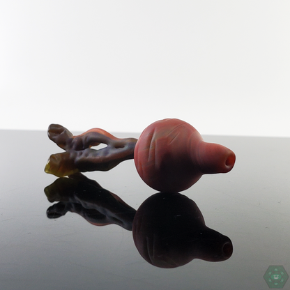 Glass By Boots Carrot Caps with a fun carrot-inspired shape, delivering precise airflow for optimal dabbing performance