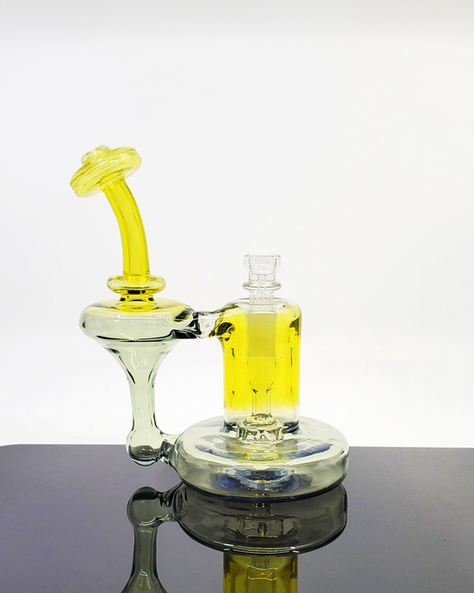 Glass Tribe CFL Bell Recycler featuring mesmerizing color-changing glass with smooth filtration for a premium dabbing experience.