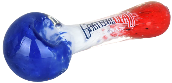 Grateful Dead x Pulsar Grateful Frit Spoon Pipe – 4.5-inch hand pipe with comfortable tapered mouthpiece. Made from durable borosilicate glass with red, white, and blue frit design. Includes luxury branded box.