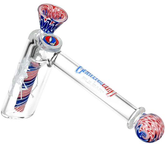Grateful Dead x Pulsar Wig Wag Hammer Bubbler – Compact 4-inch glass pipe with 14mm male herb slide. Features Grateful Dead themed accents including dancing skeleton and Stealie logo, perfect for daily use or celebrations.