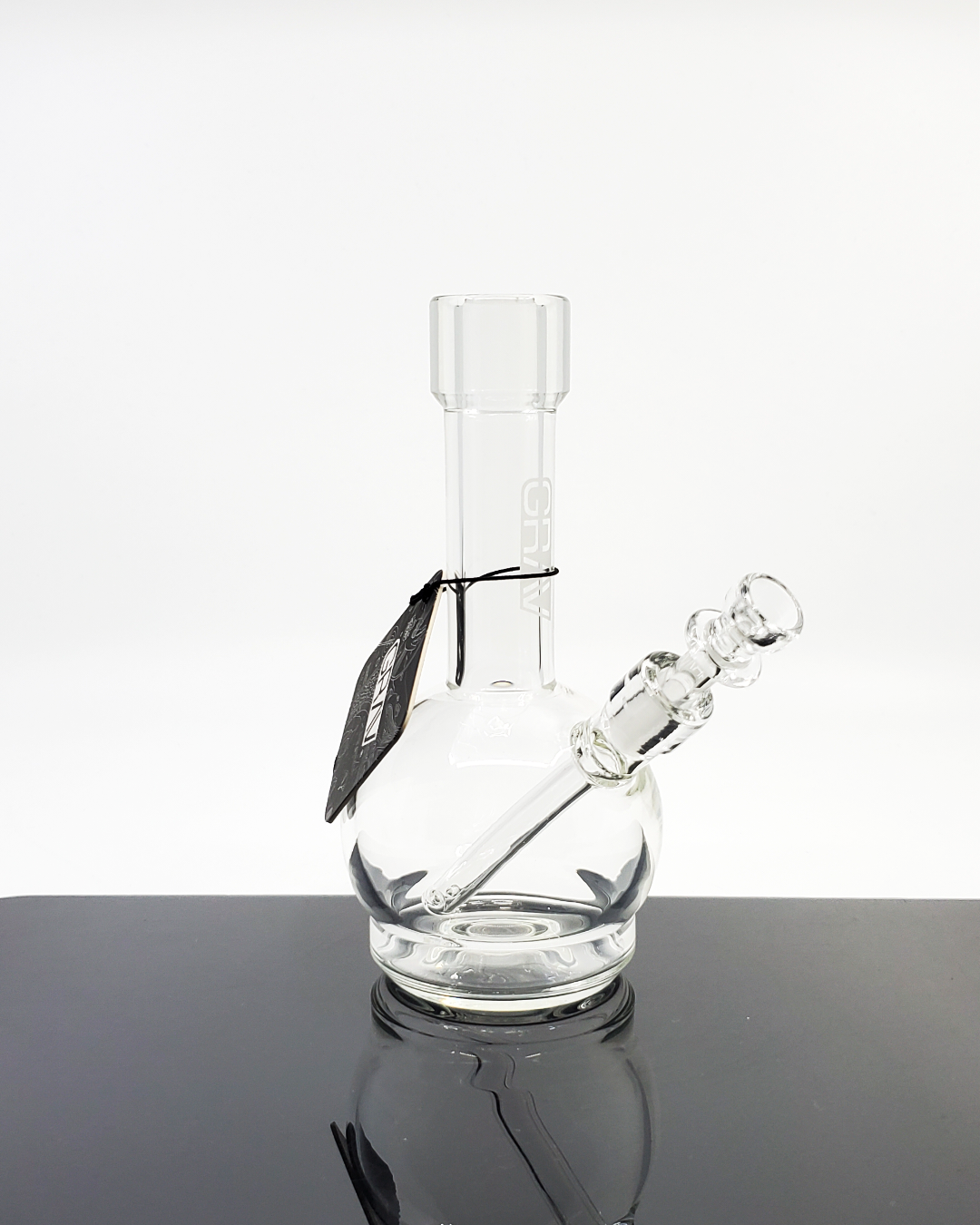 GRAV Labs Mini Round Base Beaker, a compact 5-inch glass bong designed for portability and smooth filtration.