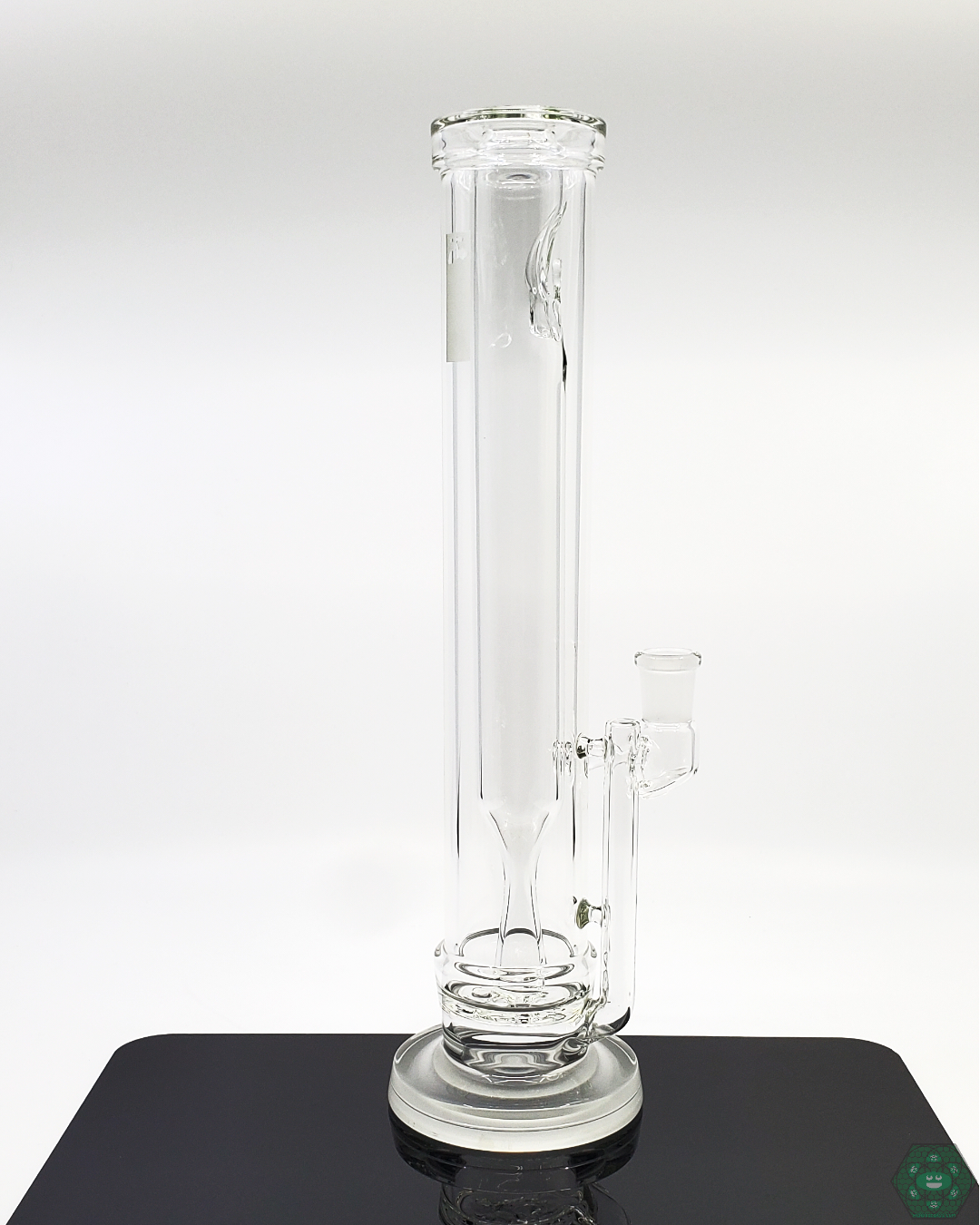  Angled view of the Hamm's Waterworks Outside-In #391 Glass Rig, displaying its elegant borosilicate glass construction and efficient percolation system.