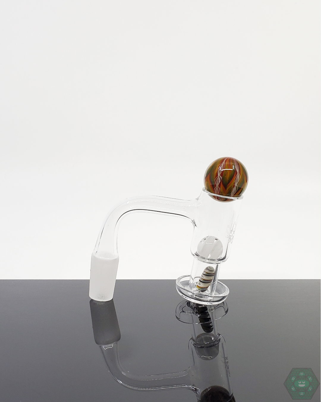 Exclusive Harold Cooney Glass Slurper Set designed to maximize flavor with terp pearls, a terp valve, and 25mm marble.