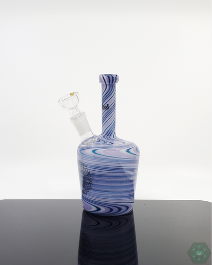 iDab Henny Bottle with intricate pink and purple line work, 14mm joint, combining function and style for glass collectors