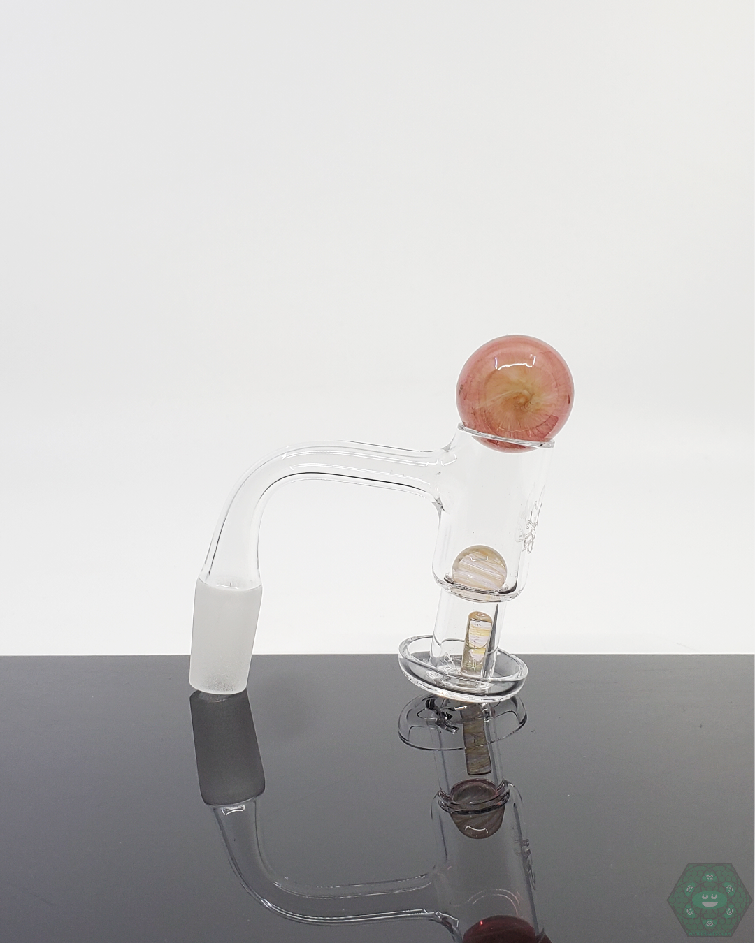 JFK Glass Slurper Set Bundle in action, enhancing vaporization and refining taste for quartz nail enthusiasts.