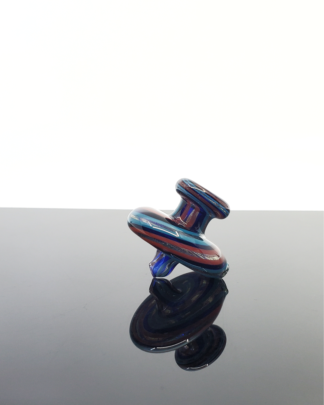 Side view of the Jon E Walker Directional Cap, showcasing its high-quality craftsmanship and airflow control for optimal dabbing performance.