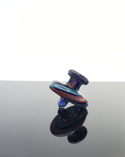 Side view of the Jon E Walker Directional Cap, showcasing its high-quality craftsmanship and airflow control for optimal dabbing performance.