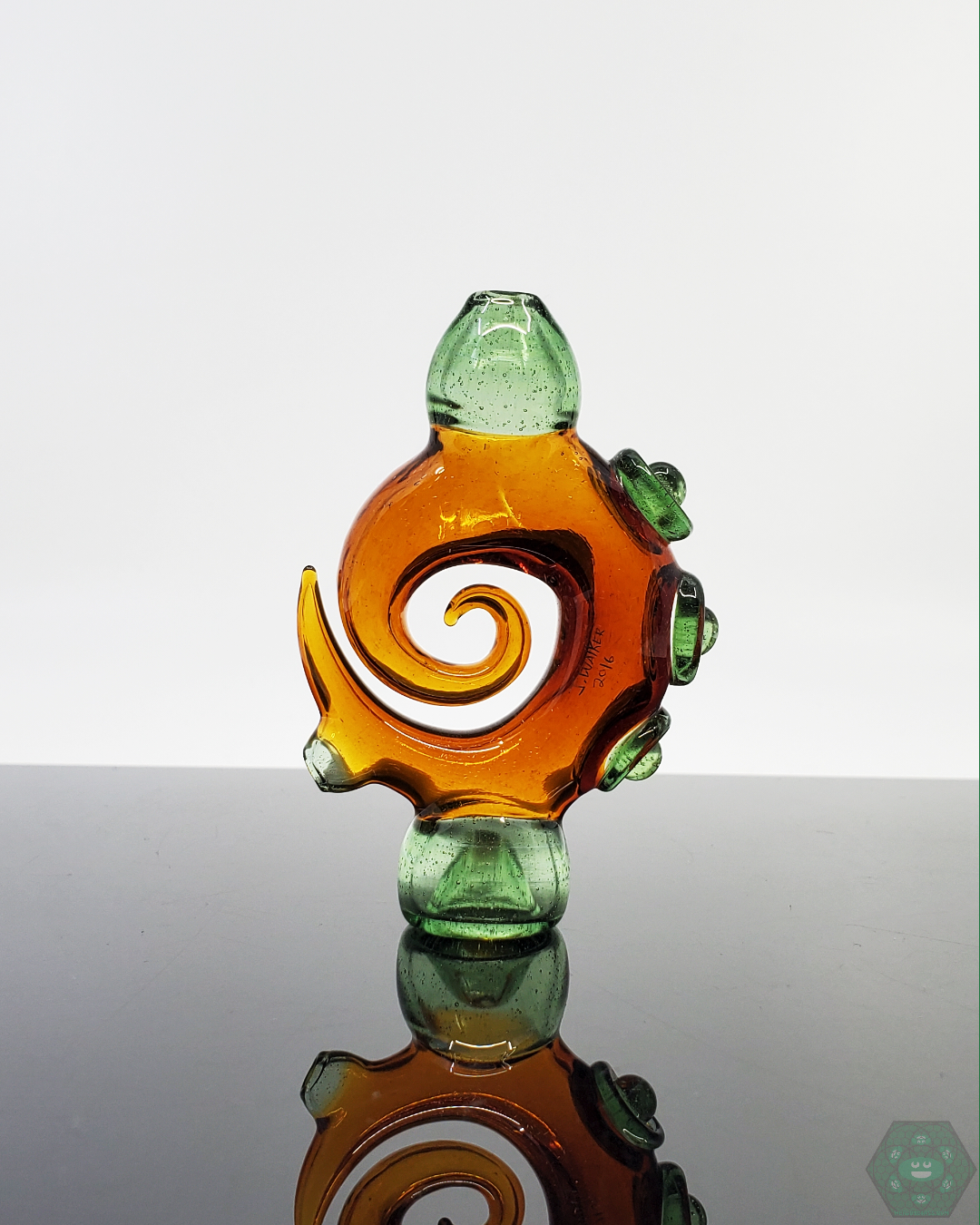 Jon E Walker Spiral Onie, 3.5-inch dichroic glass chillum with unique twist design in Amber/Green and Green options for high-quality, compact glassware