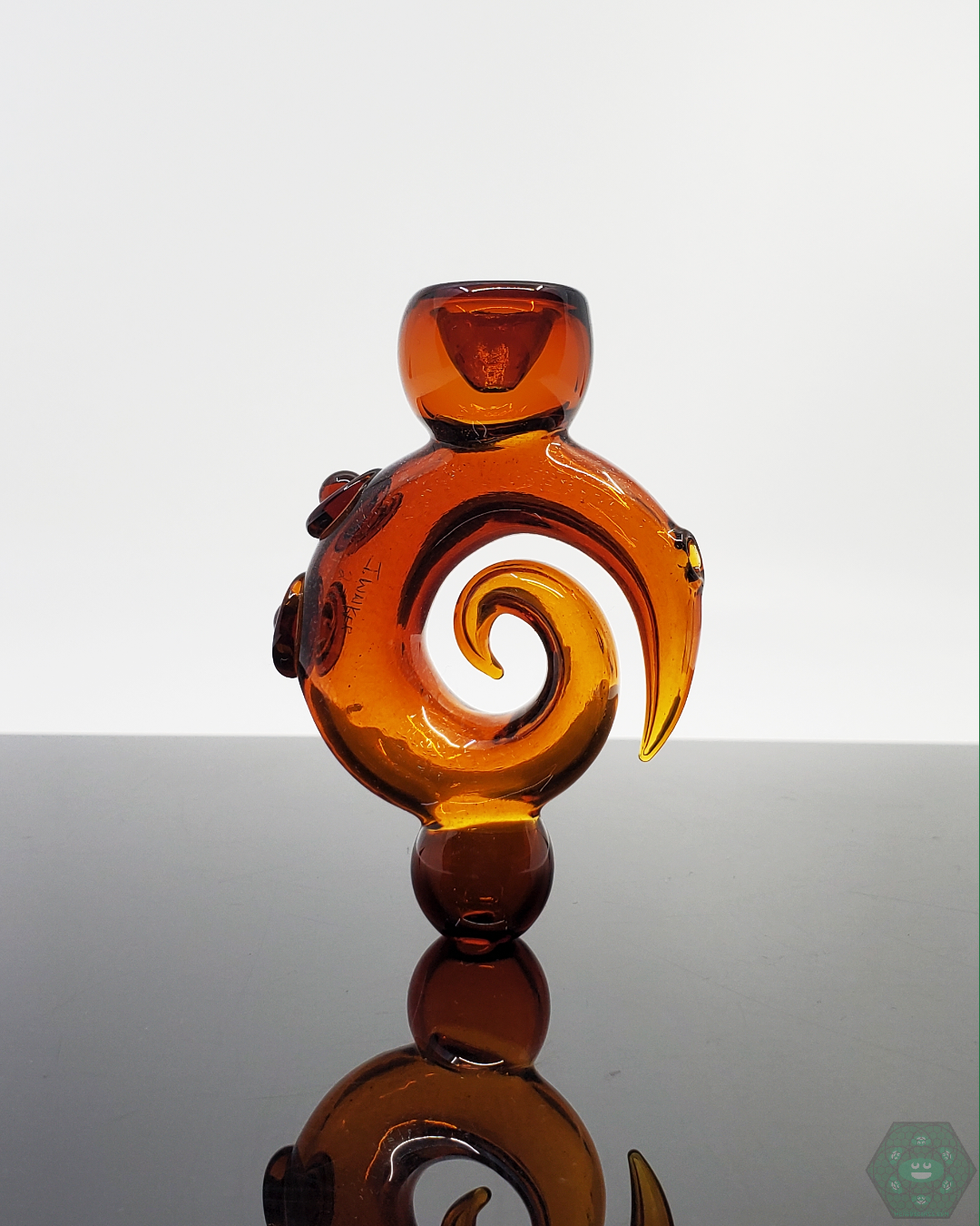 Handcrafted Jon E Walker Spiral Onie, a 3.5-inch dichroic glass chillum with a unique twist design, available in Amber/Green and Green options