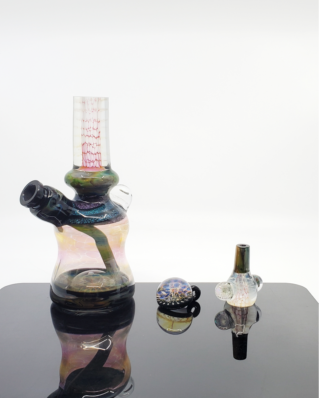 View of the 3-hole percolator inside the Kenan Tiemeyer Mini Tube, designed for smooth filtration and functionality.